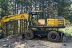 Mobilbagger Komatsu PW200-7 mit WOODY WH6