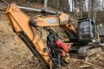 Raupenbagger CASE CX 210C NLC mit Woody WH60-1
