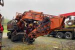 Baggerprozessor Hitachi ZX210W mit Winde und Woody 60